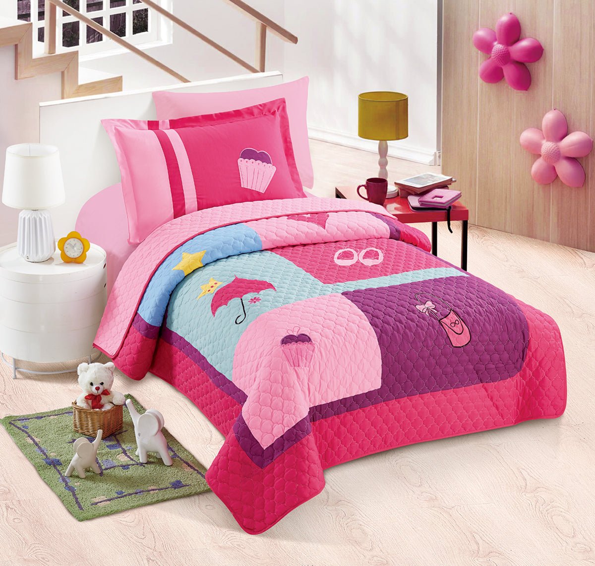 A bedding set with a cake and umbrella print, displayed on a bed with other room decorations that include a nightstand, lamp, and decorative items.