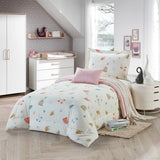 A floral print bedding set on a bed in a bedroom setting, with accompanying pillows, bed frame, and room decor.