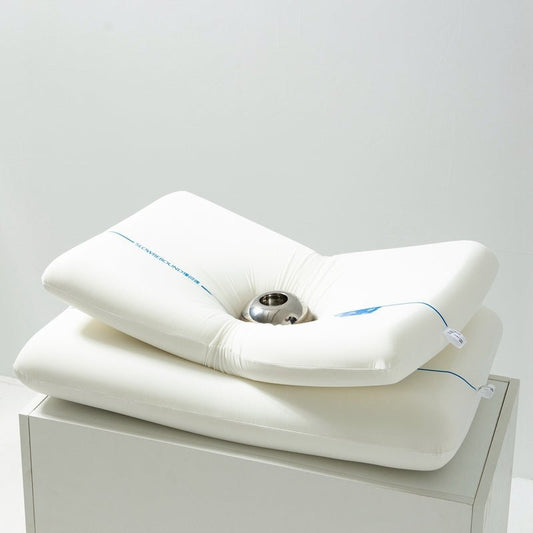 A white memory foam pillow with a contoured design, displayed on a neutral background.
