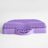 A purple TPE dynamic pressure relief pillow designed with a geometric pattern