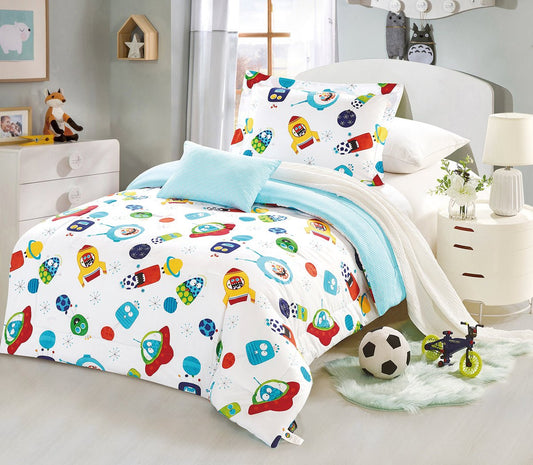 A bedding set with a space-themed print, featuring rockets and planets, displayed in a child's room.