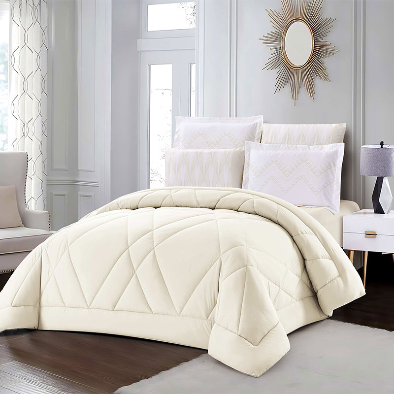 Neatly made bed with white bedding in a bedroom setting